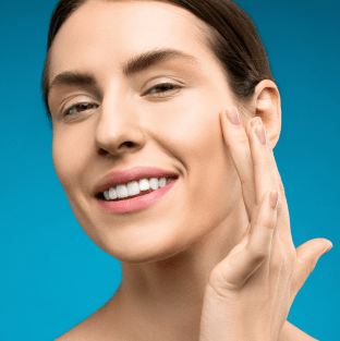 woman touching her face