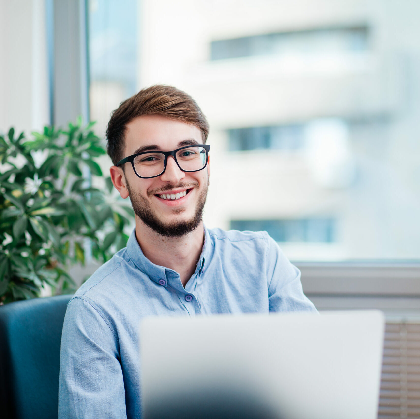 smiling man in the office