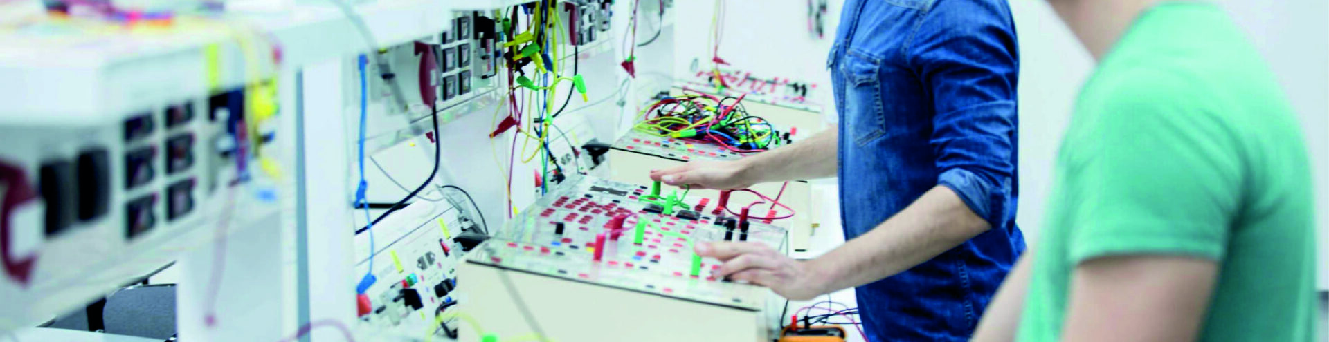 Men doing electrical tests
